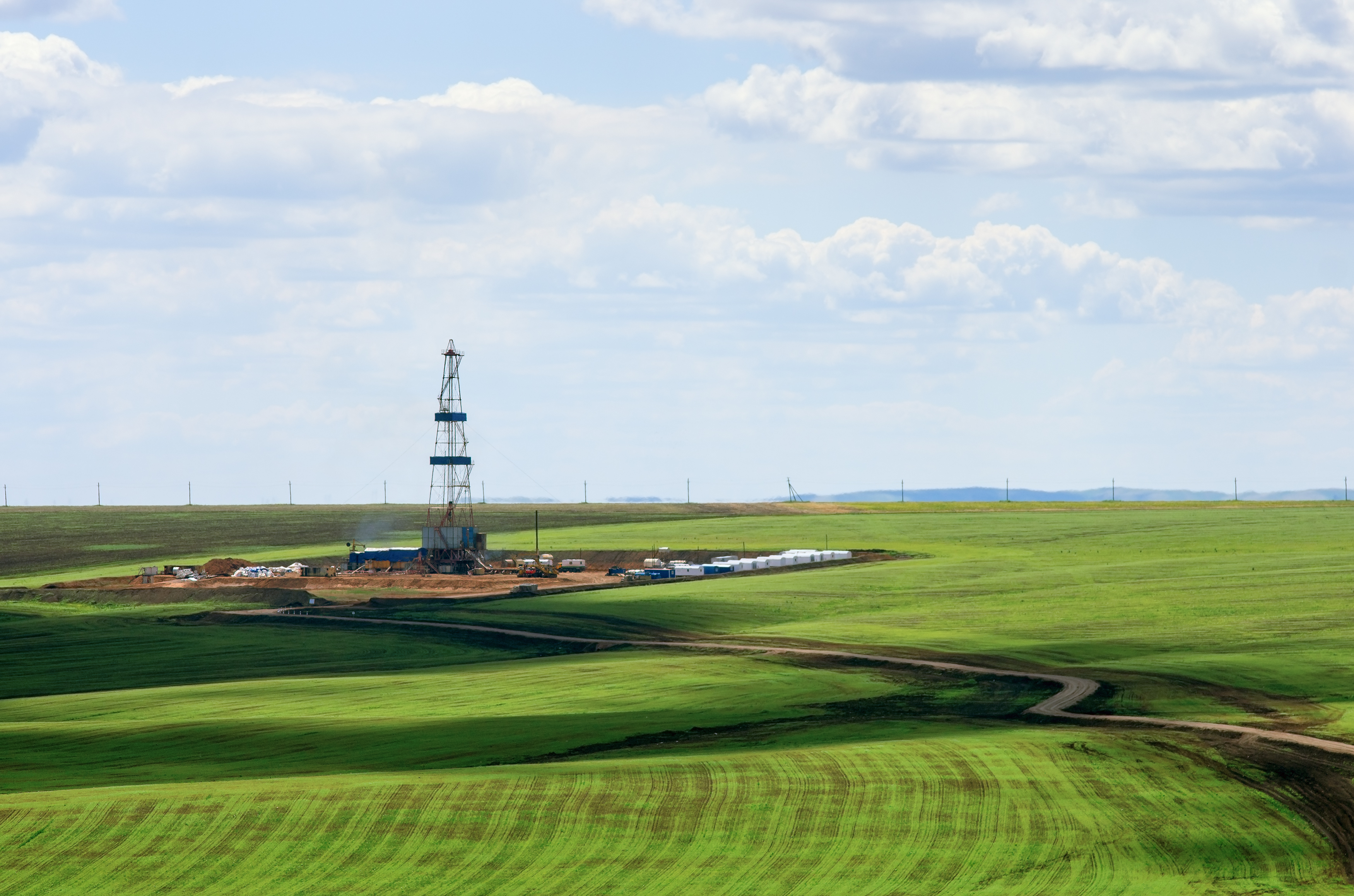 Drilling rig in a field.