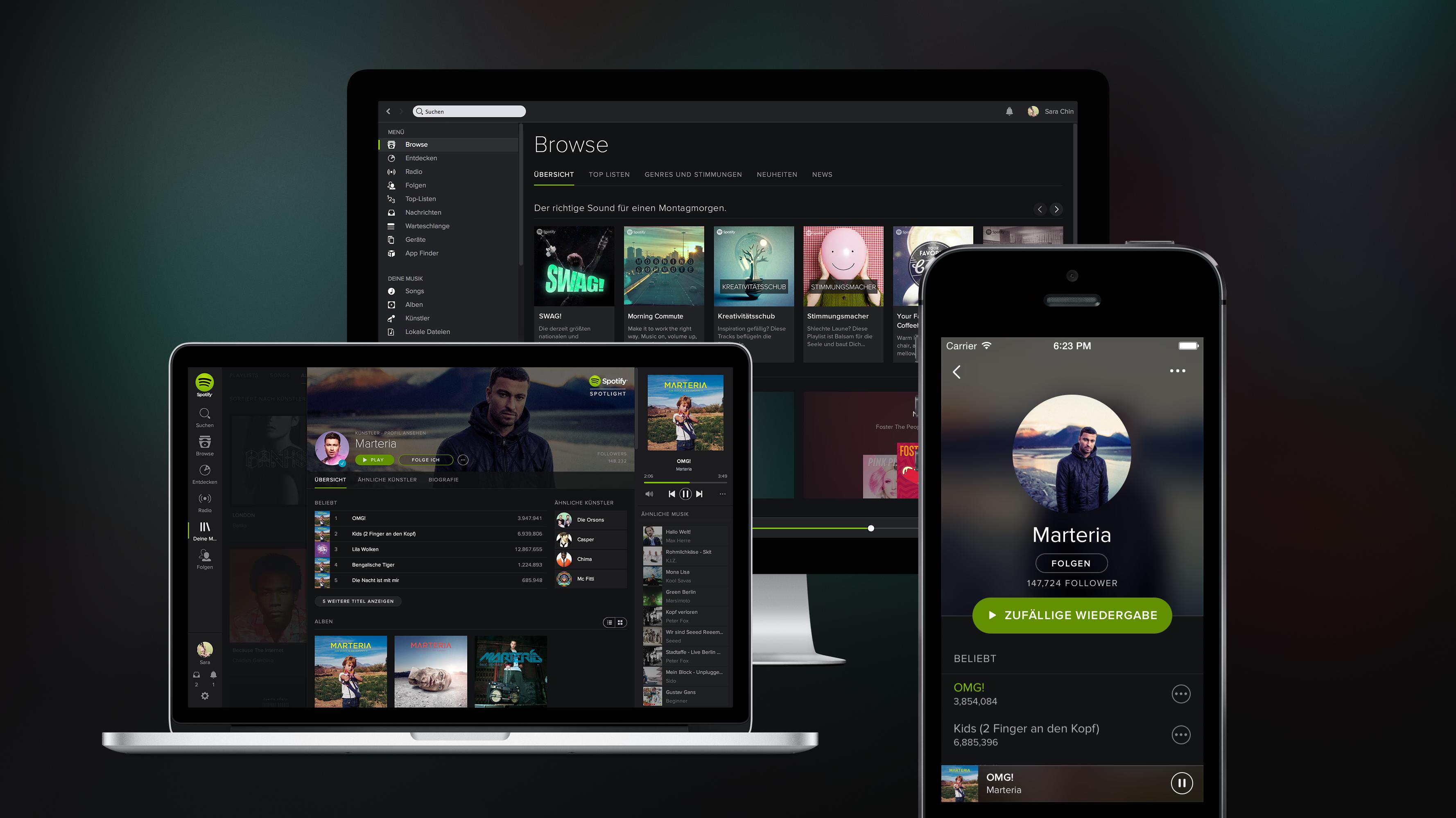 Spotify seen on tablets, laptops, and smartphones.