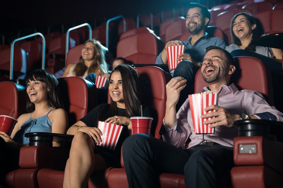 People watching a movie at a theater