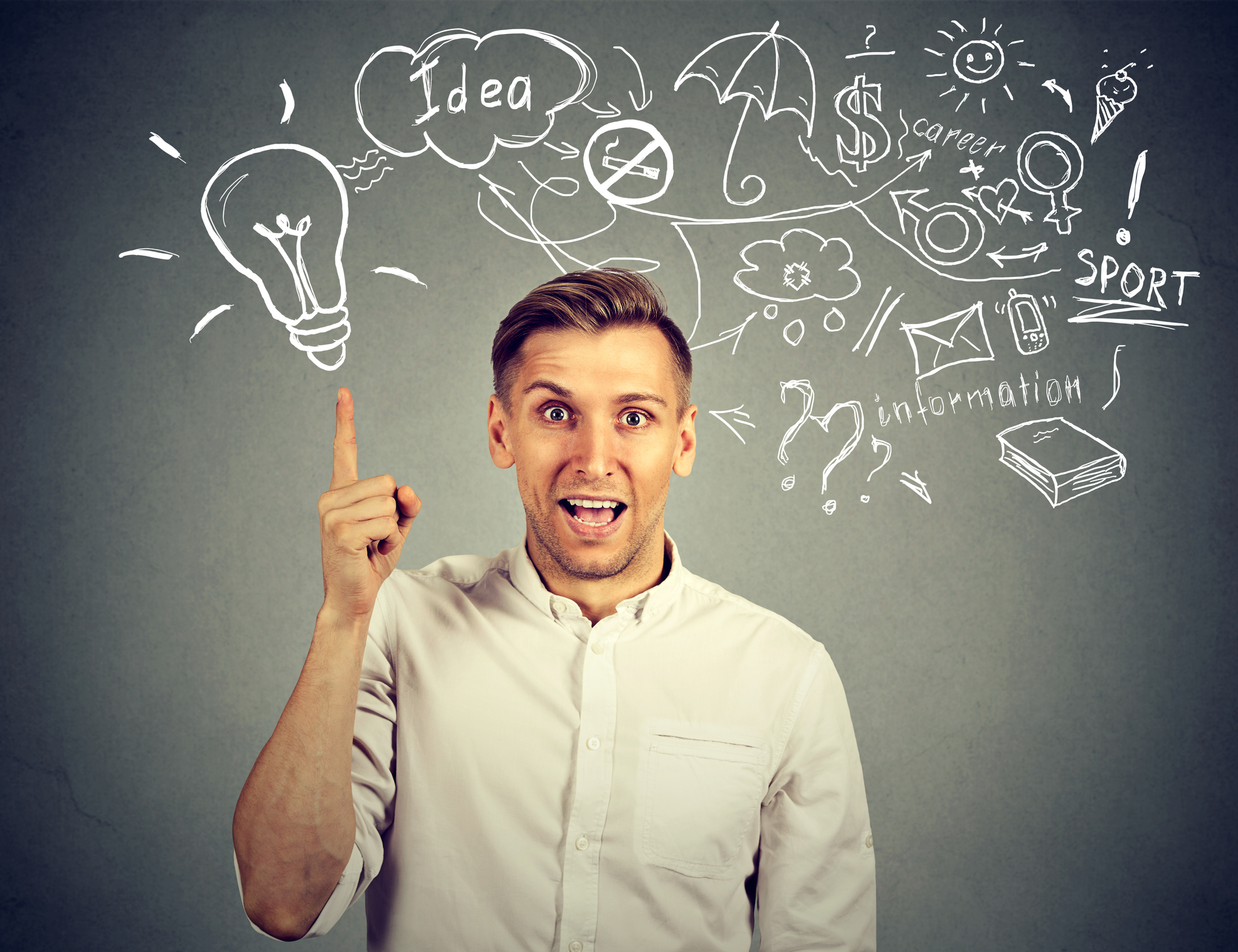 A man in a dress shirt pointing at a light bulb drawing above his head.