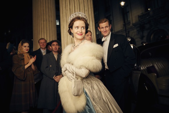 A scene from Netflix's The Crown with Claire Foy and Matt Smith attending a formal event in character.