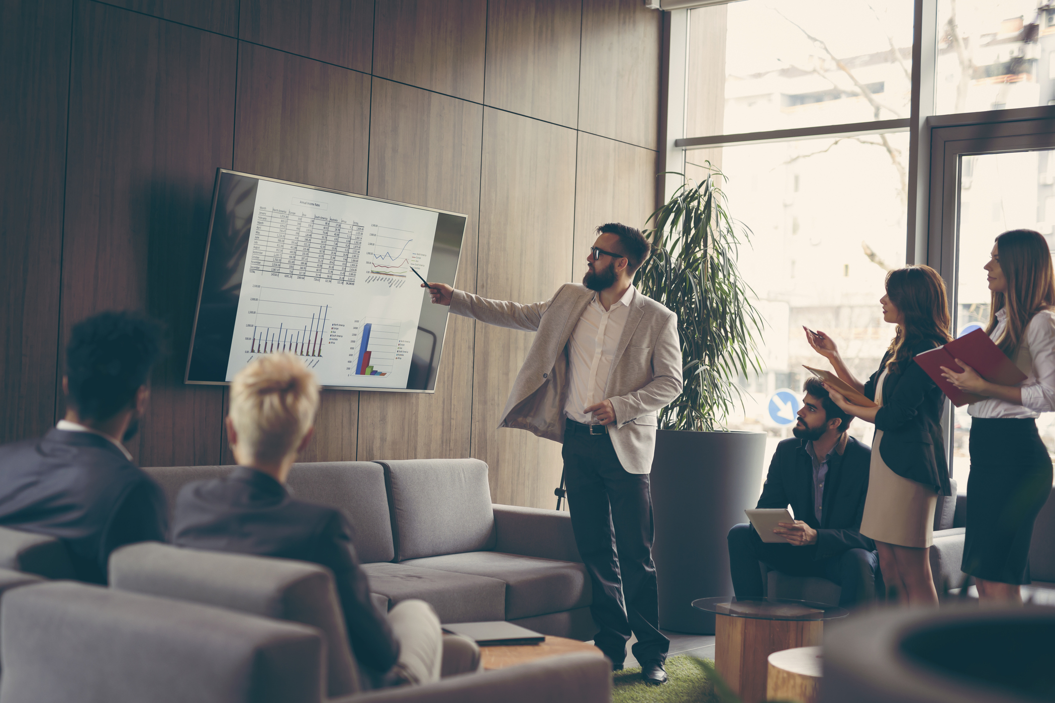 Businesspeople looking at a presentation.