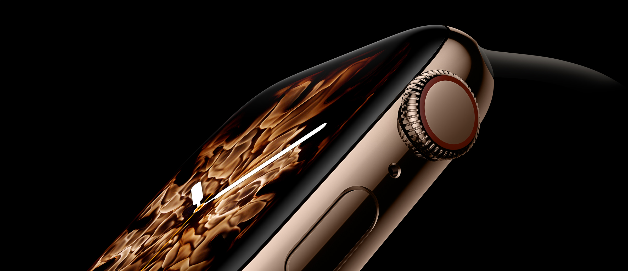 A gold Apple Watch displayed against a black background.