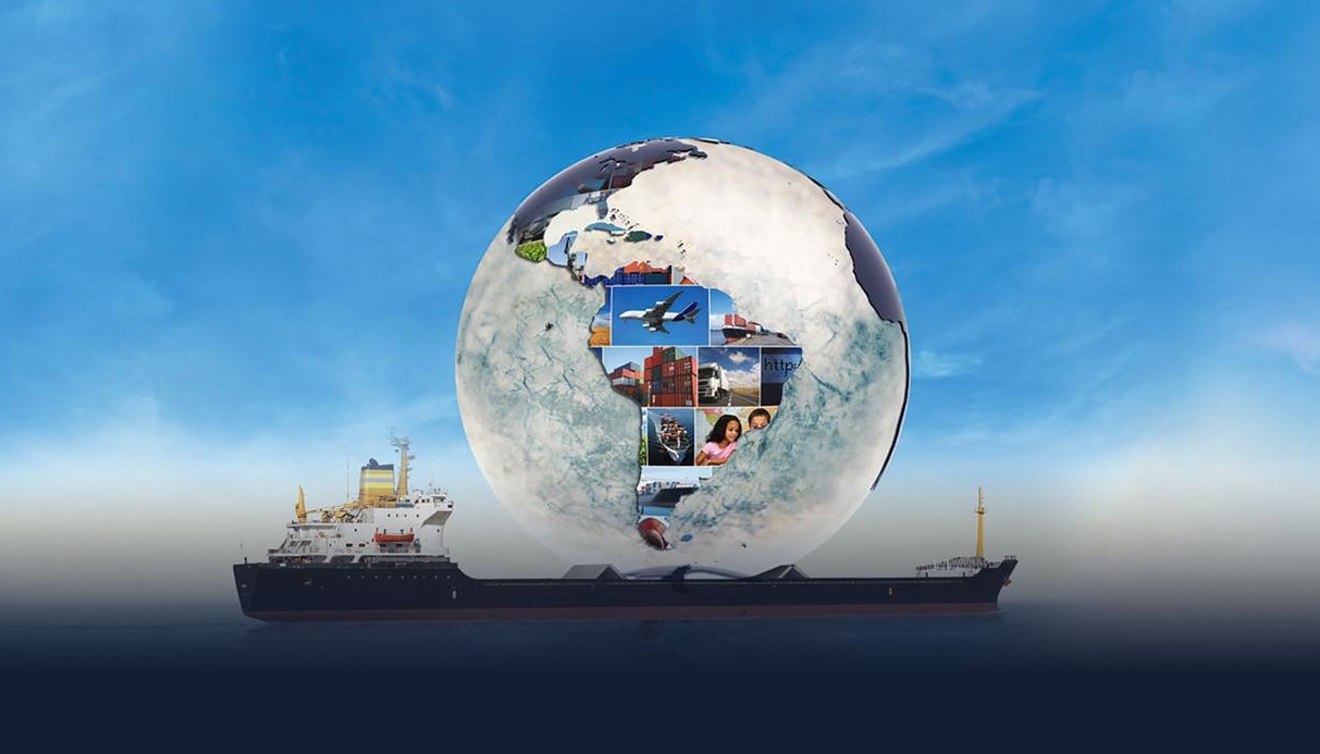 Image of glass globe shown resting on a tanker ship against a blue sky.