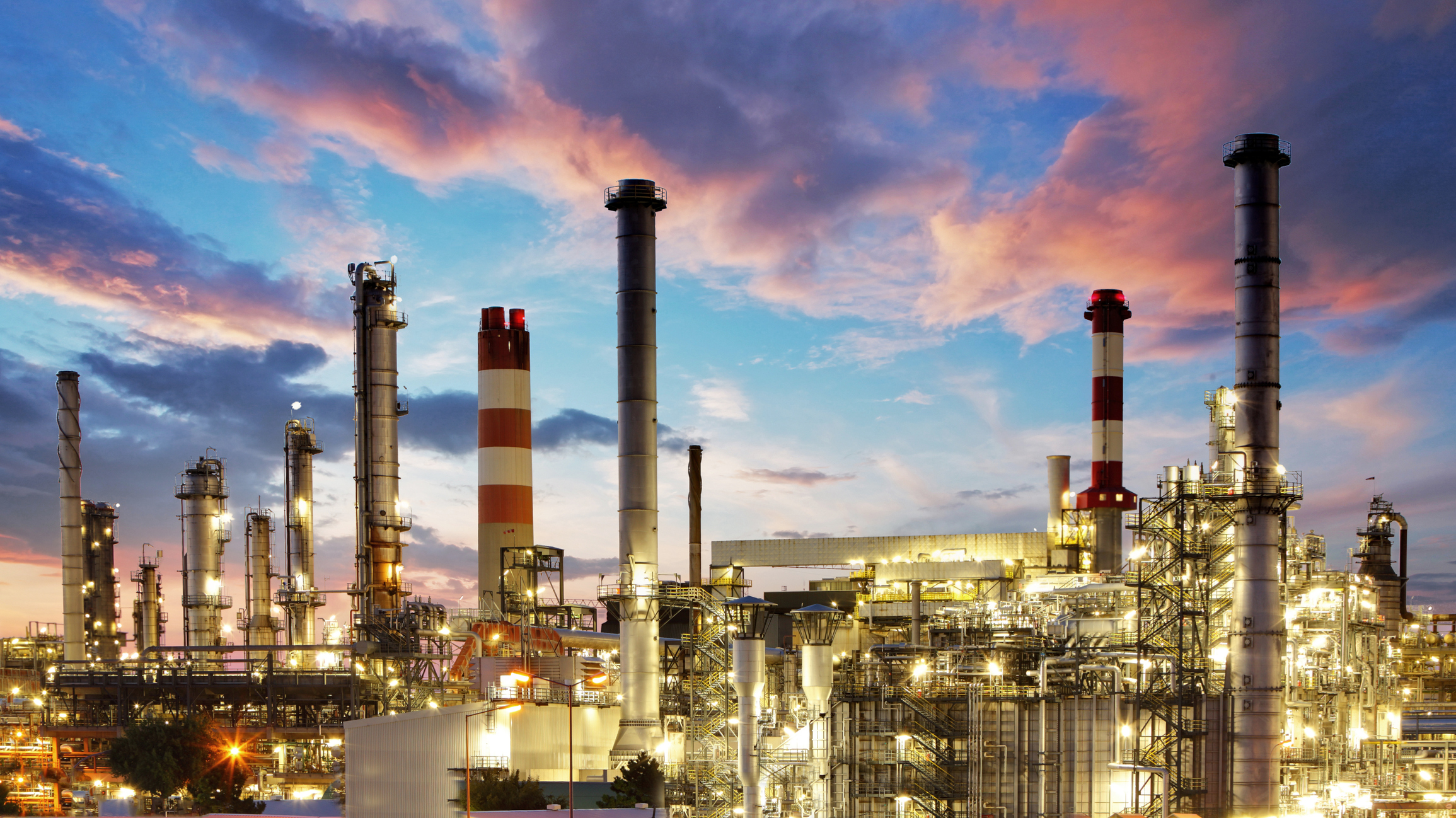 Oil refinery at sunset.
