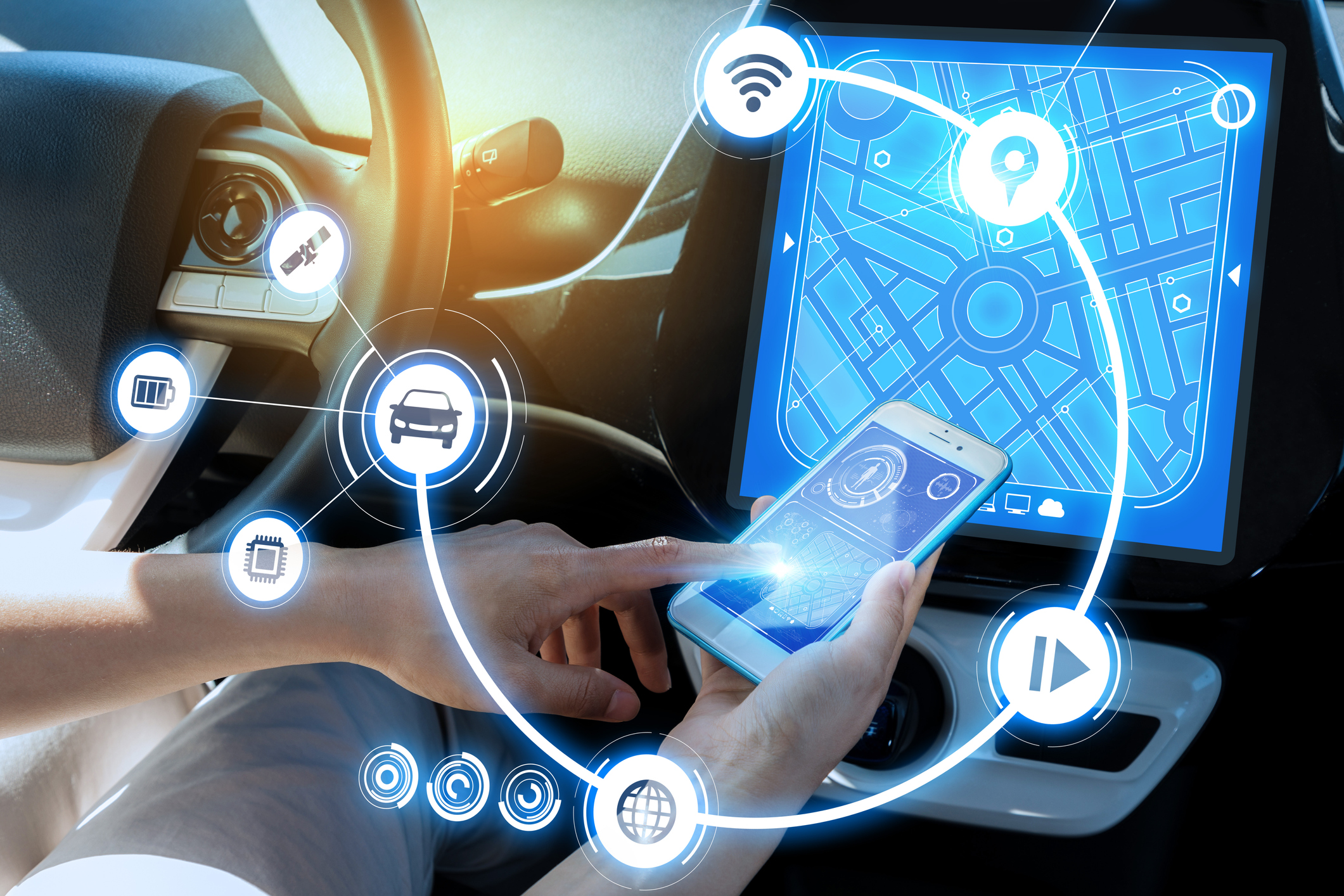 A person engaging with a smartphone in a car with a brightly lit display on the dashboard.