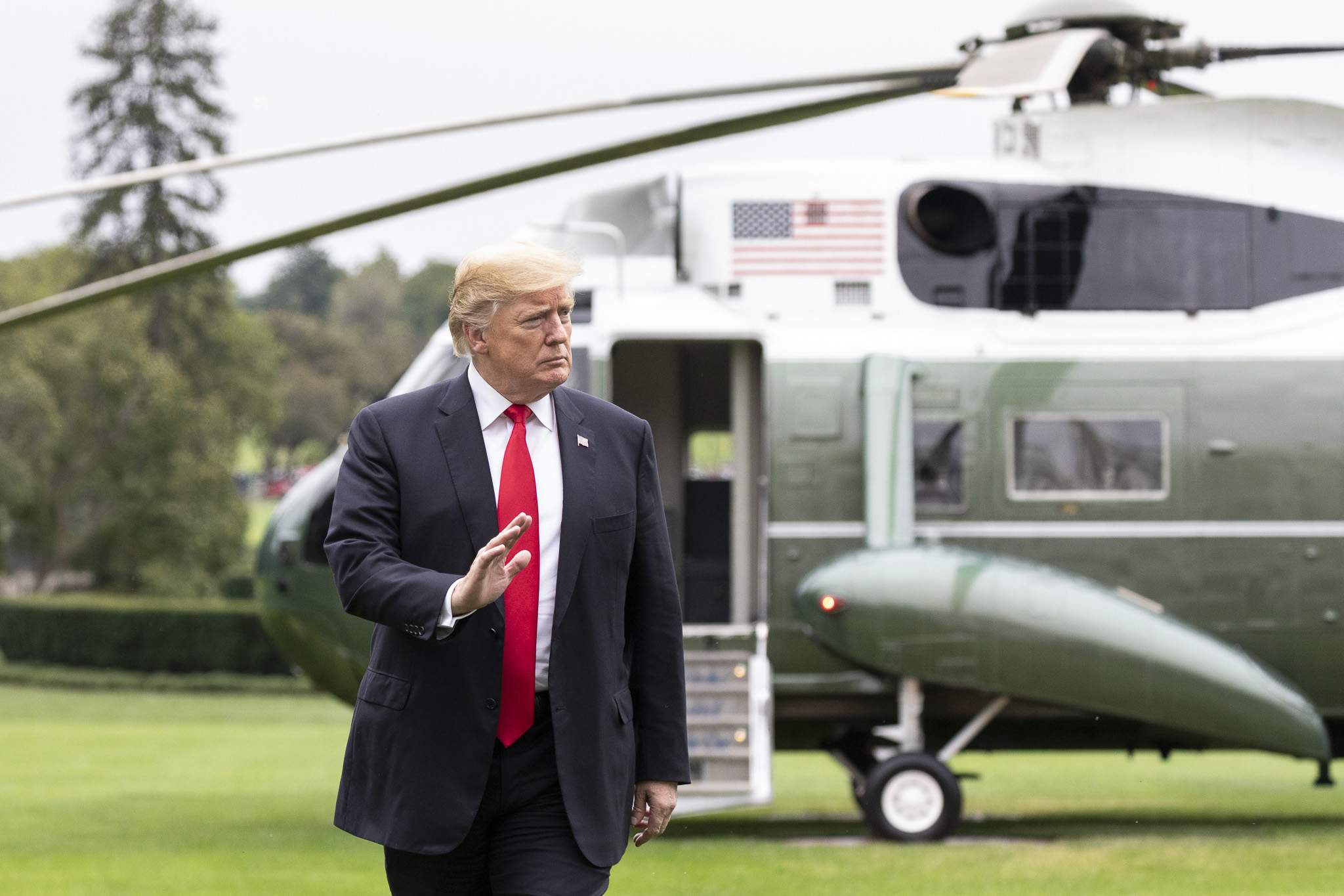 President Trump arriving by helicopter on the White House South lawn.