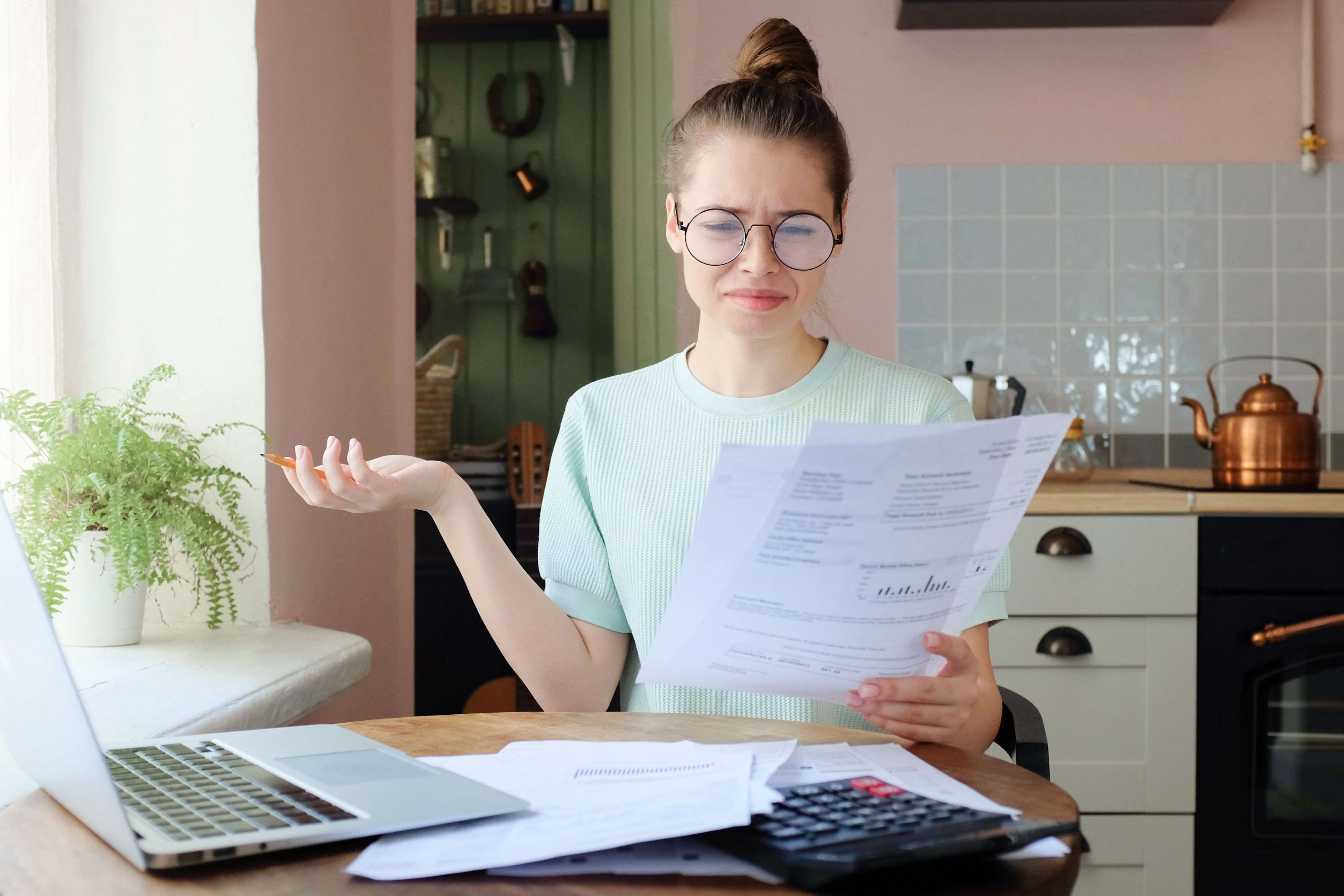 A woman confused by her financial statement