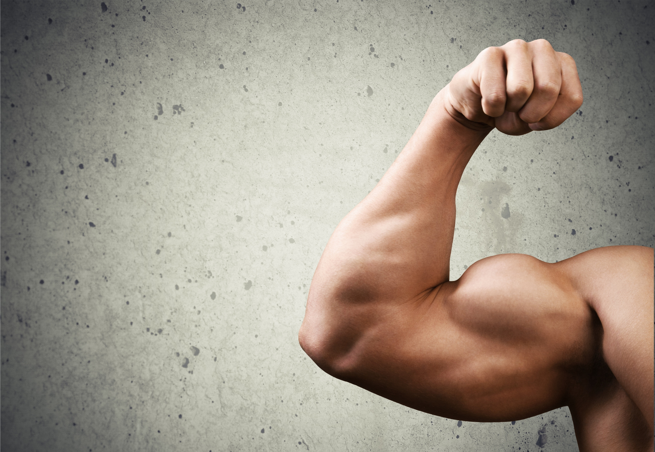 A person flexing his bicep muscle