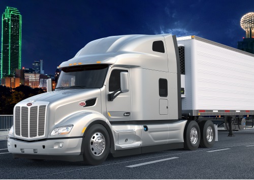 Commercial semi-truck hauling a load.