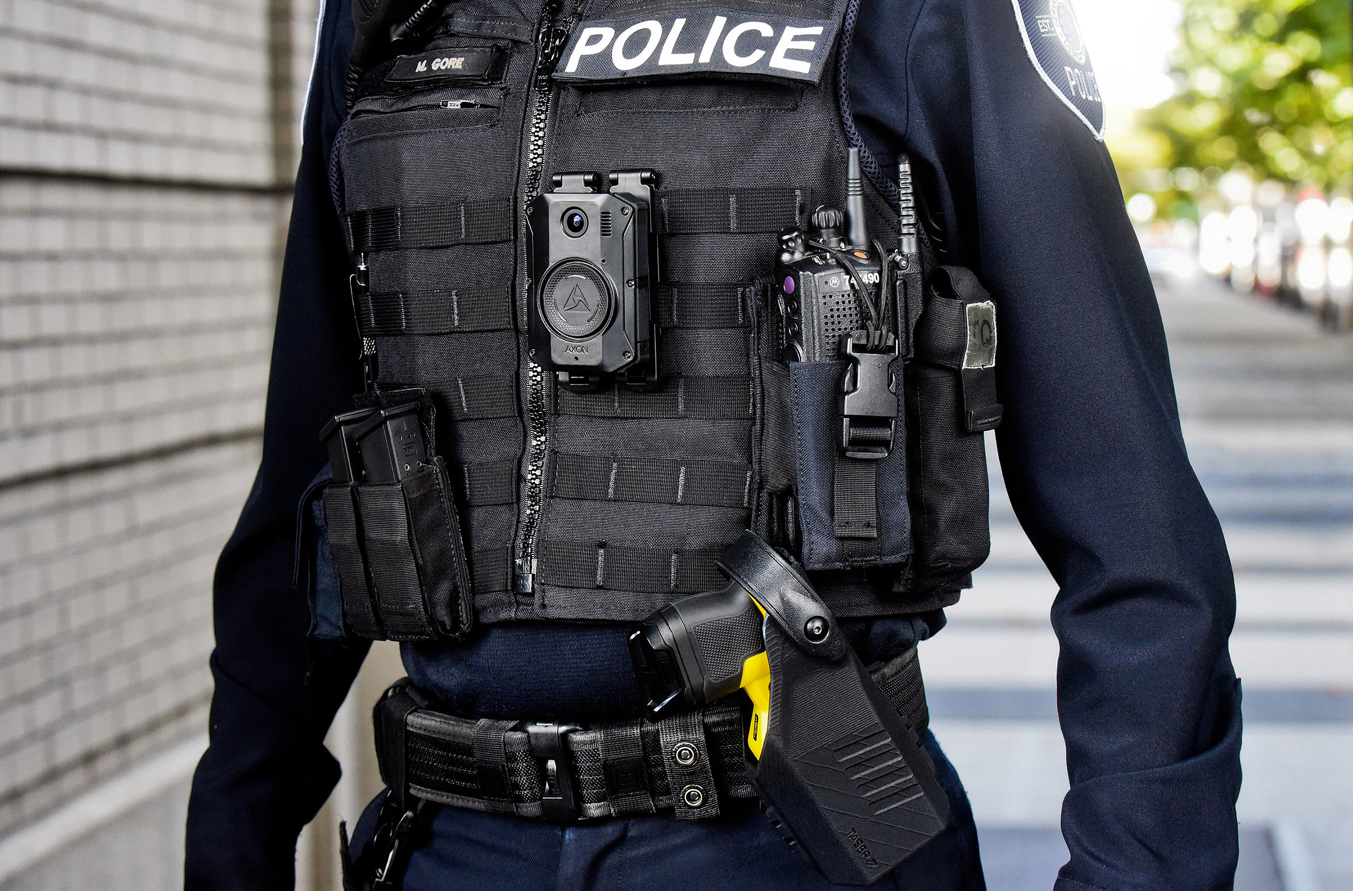 Officer wearing Axon Body 3 and Taser 7 products.