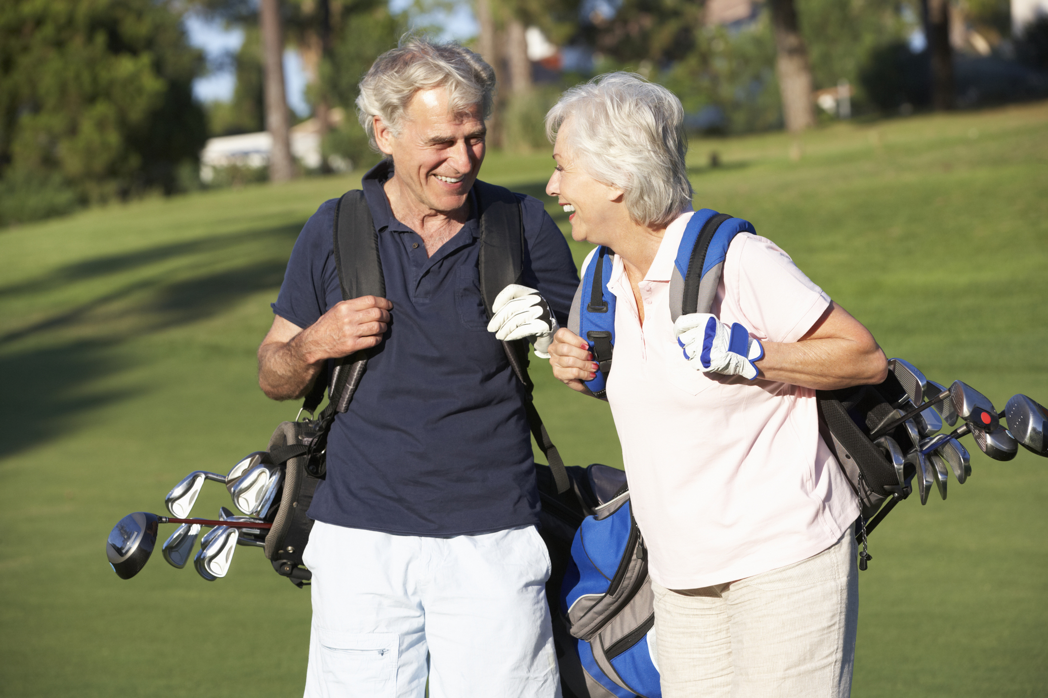 Senior couple on golf course