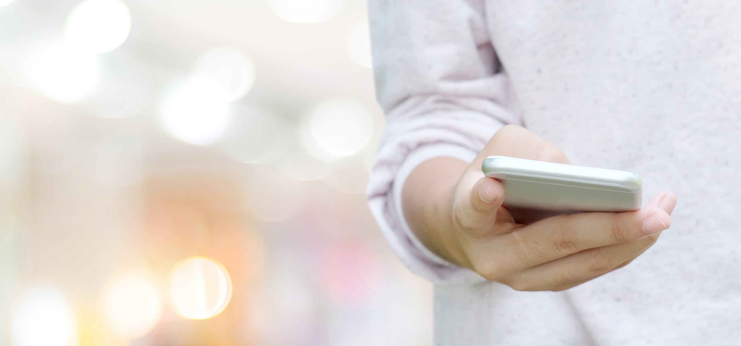 A person using a mobile phone.