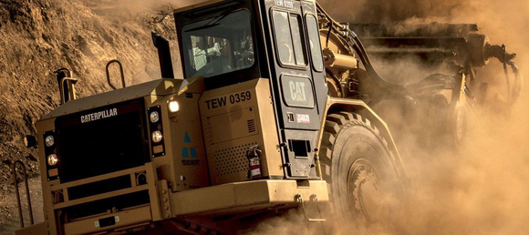 A Caterpillar machine in motion.