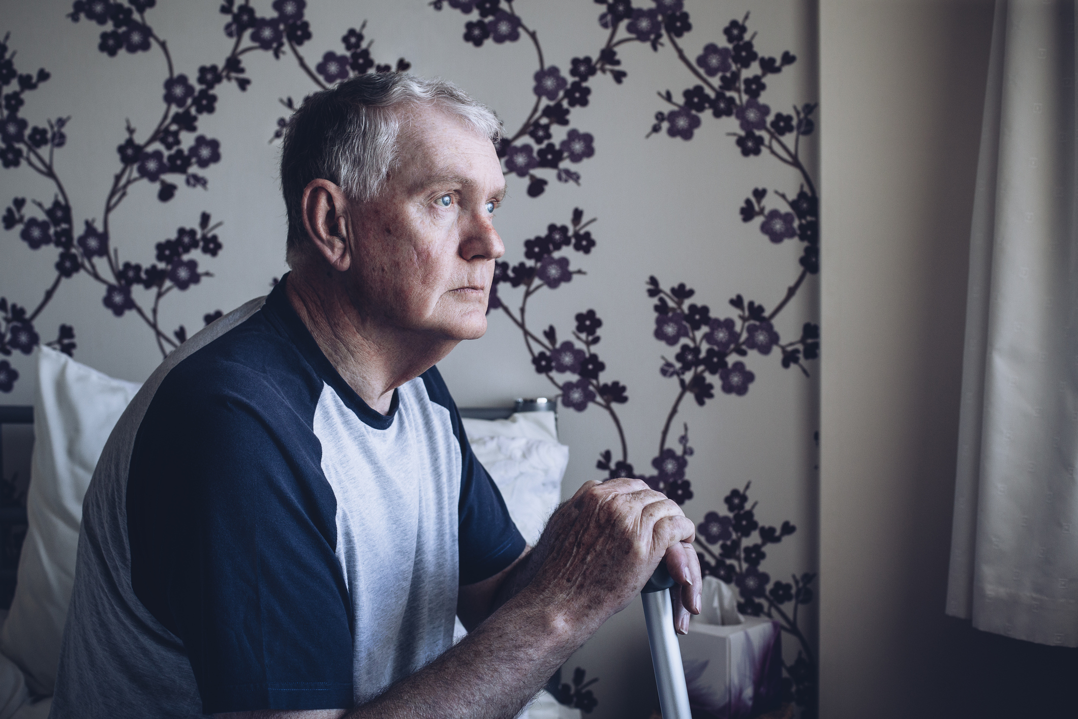 Older man with serious expression
