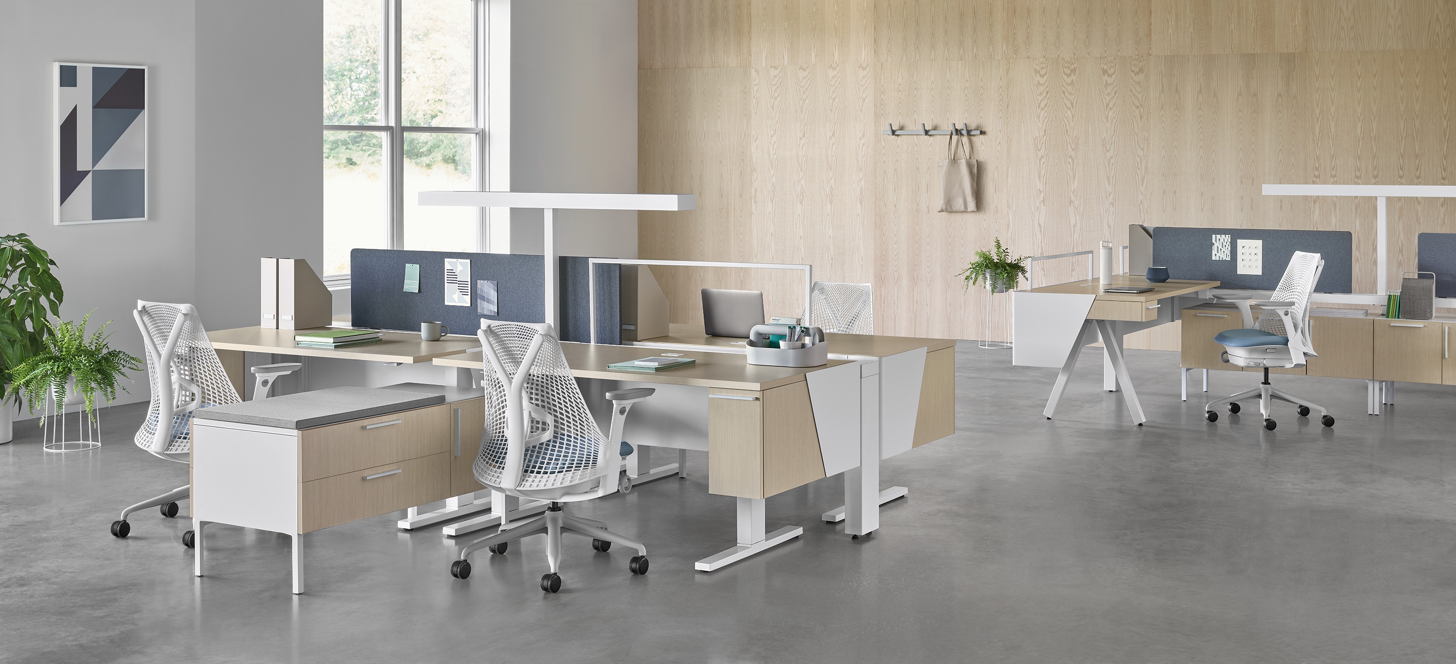 Herman Miller office furniture arranged in a large contemporary workspace.