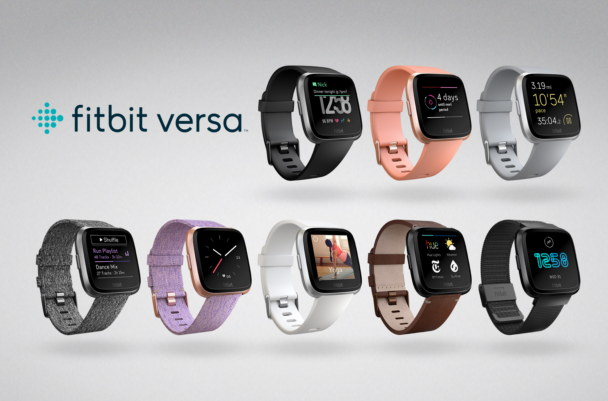Eight Fitbit Versa smartwatches in different color combinations