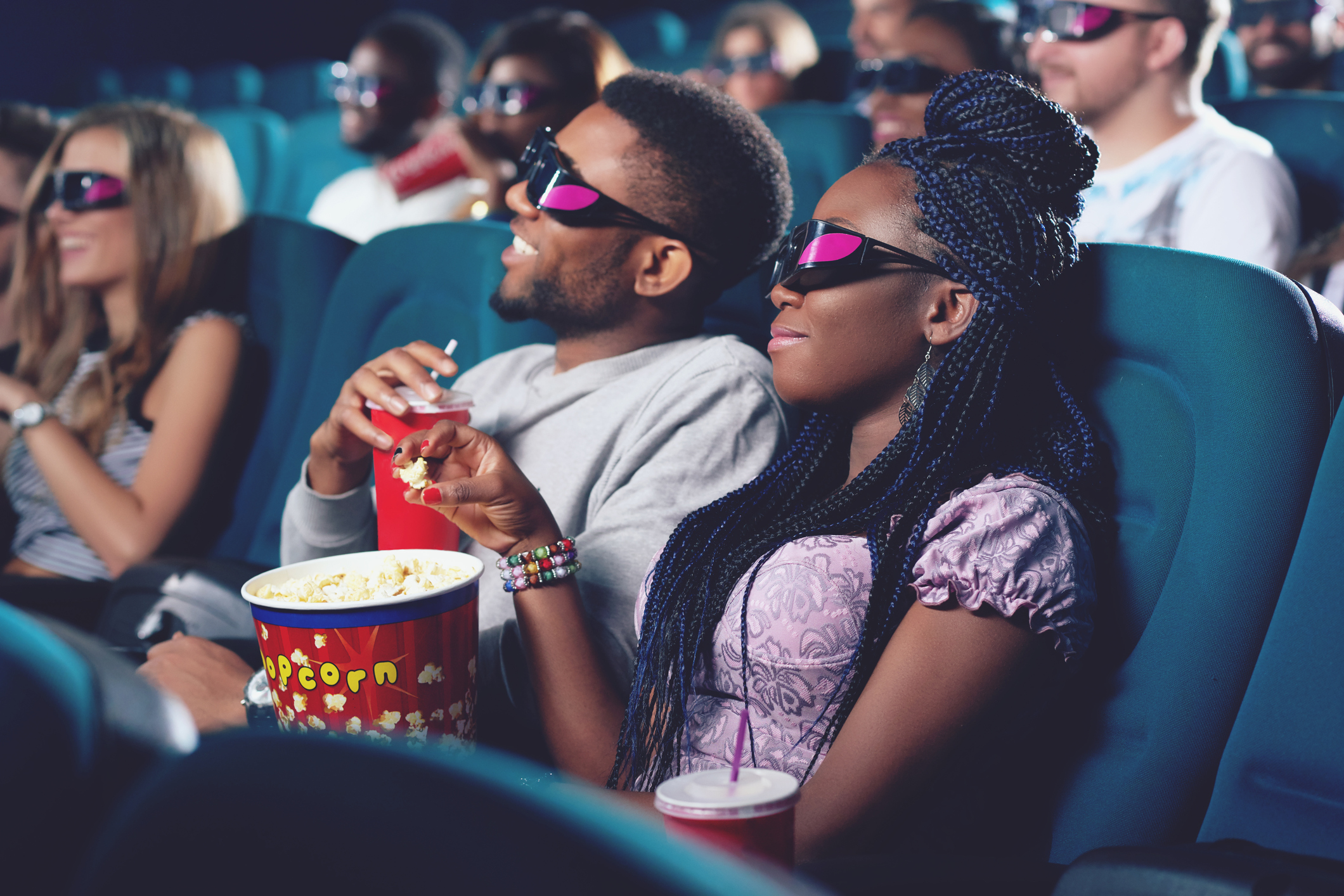 Moviegoers wearing 3D glasses