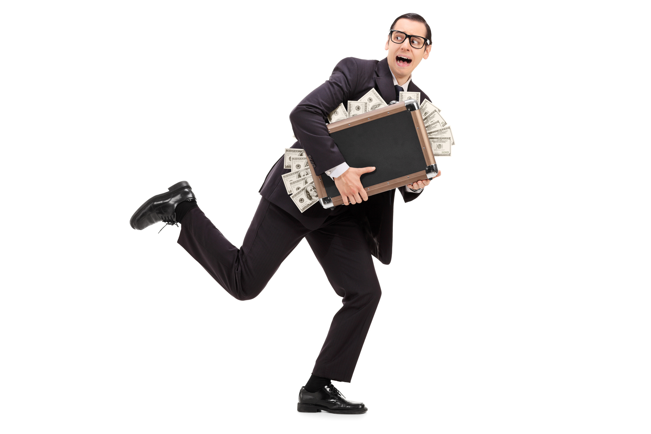 Frightened person running with a briefcase bursting with cash.