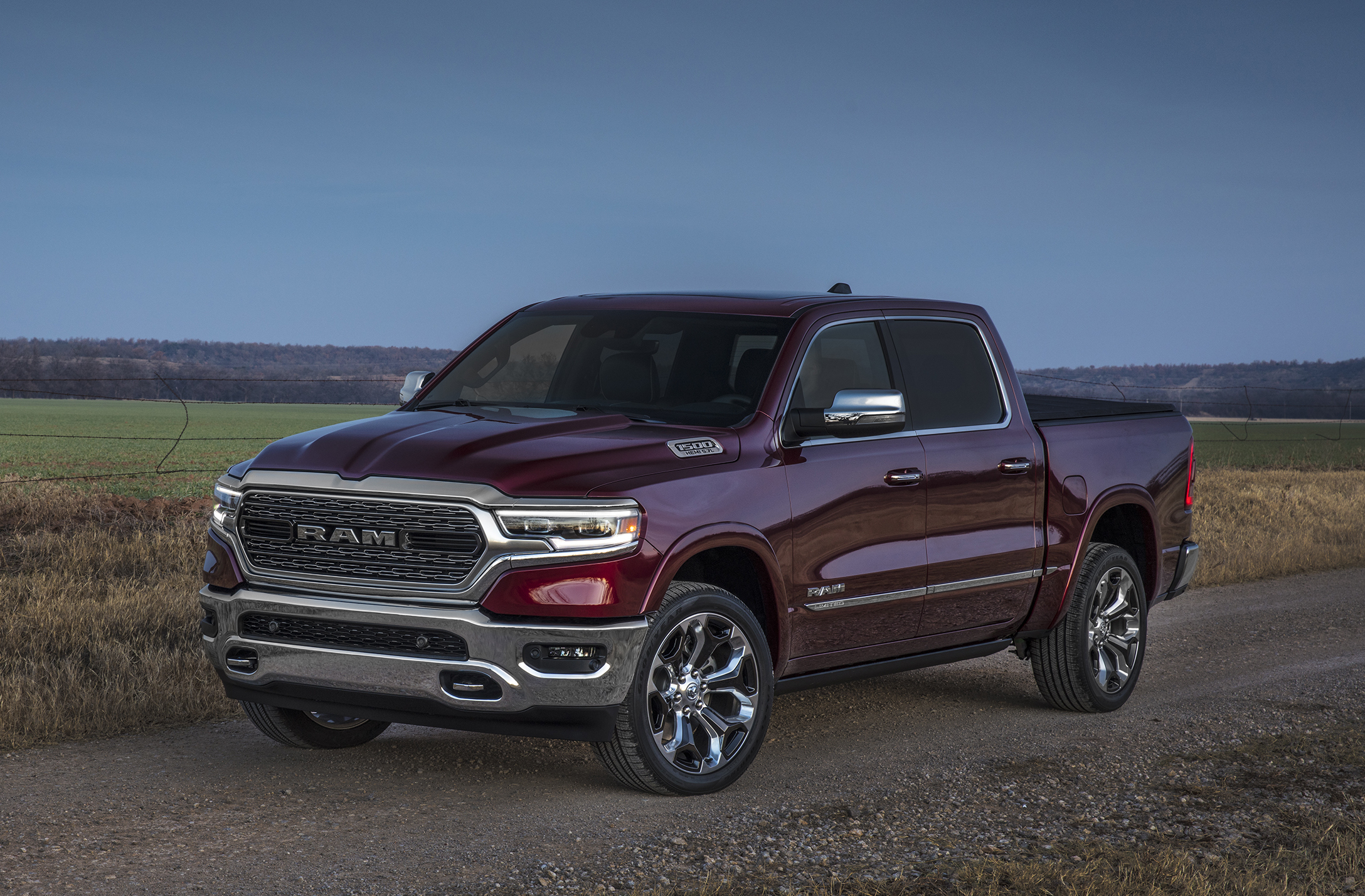 A dark red Ram 1500, a full-size pickup truck.