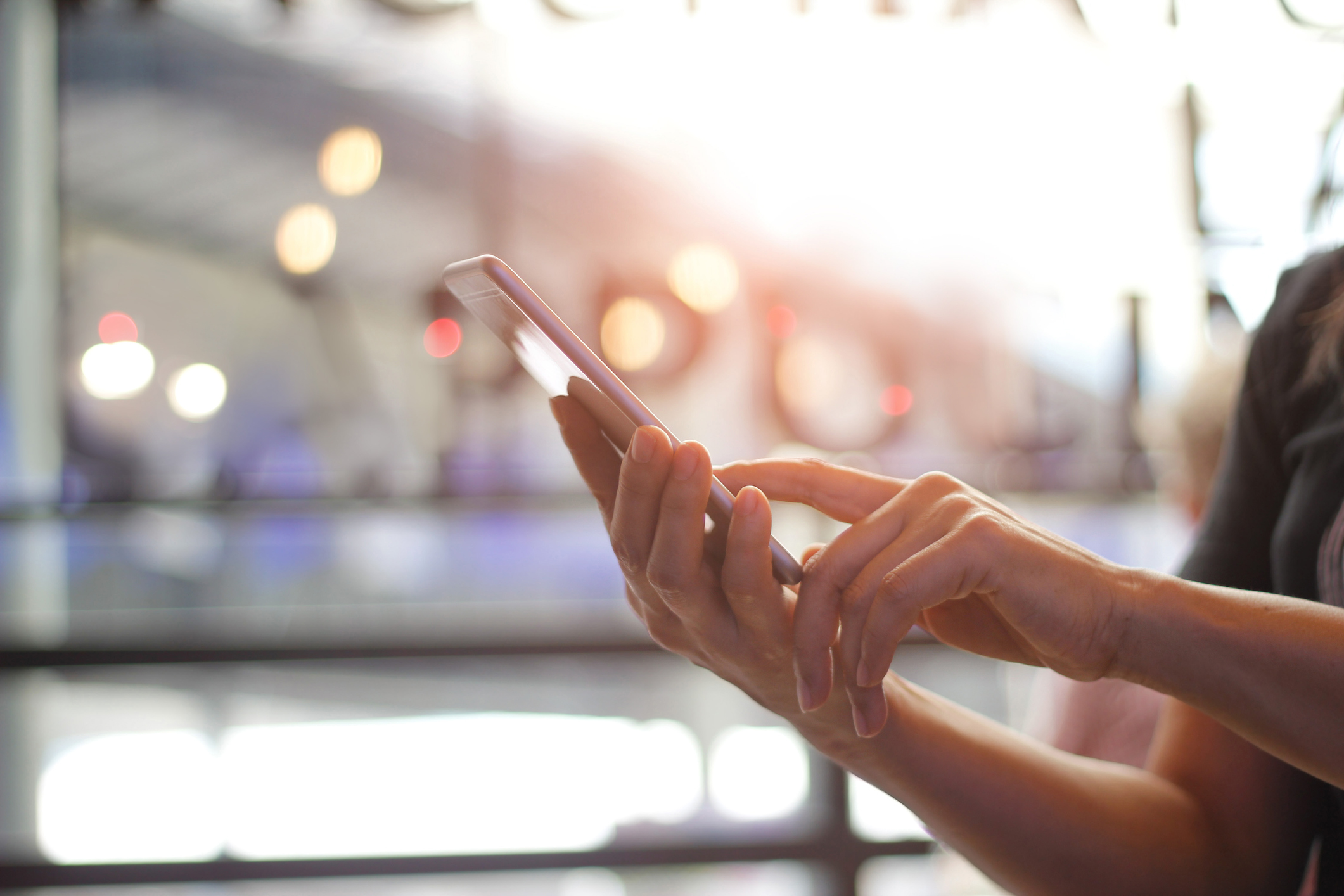 A person using a mobile phone.