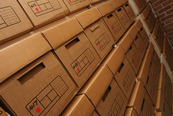 Stacks of cardboard storage boxes.