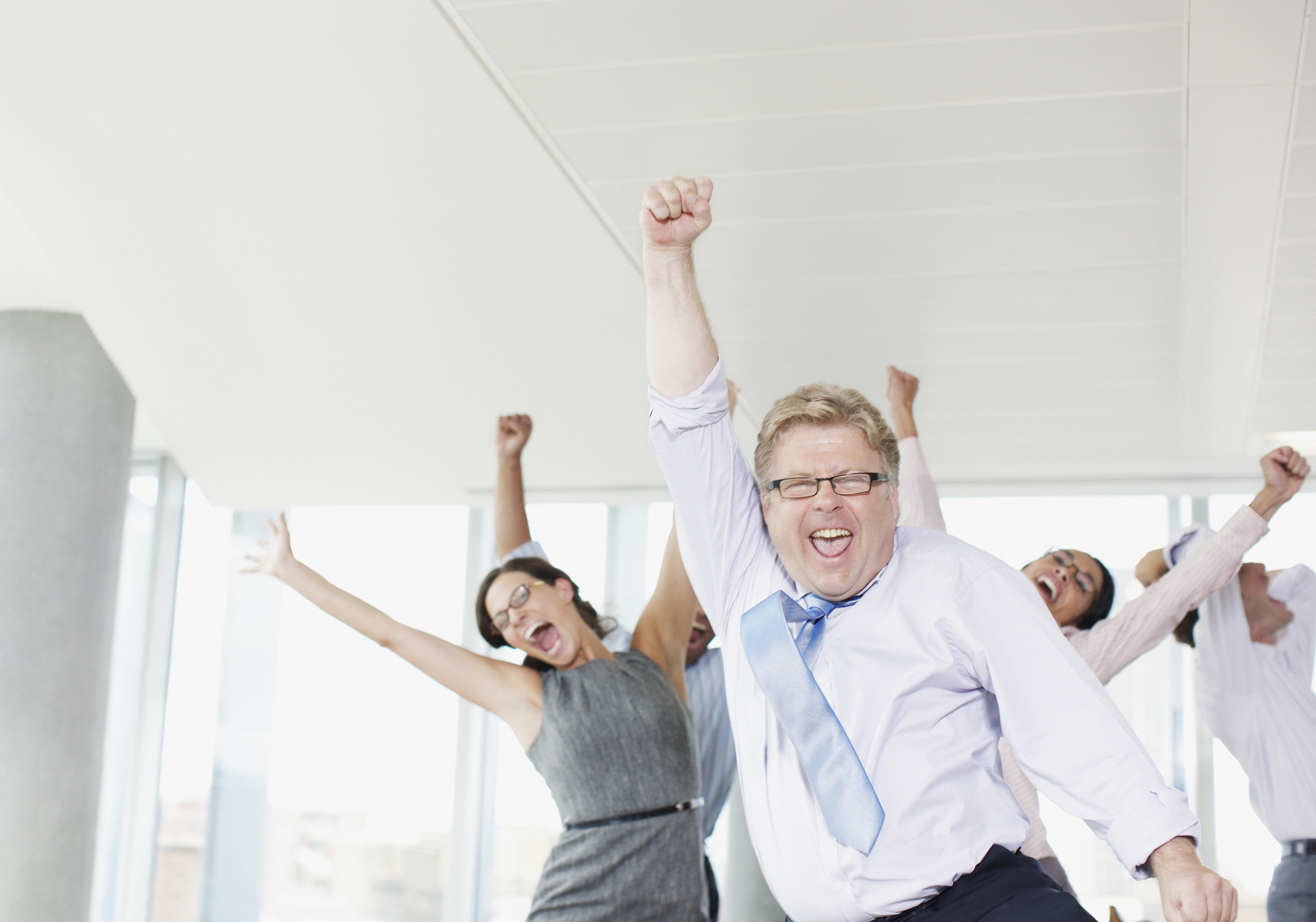 Business people cheering