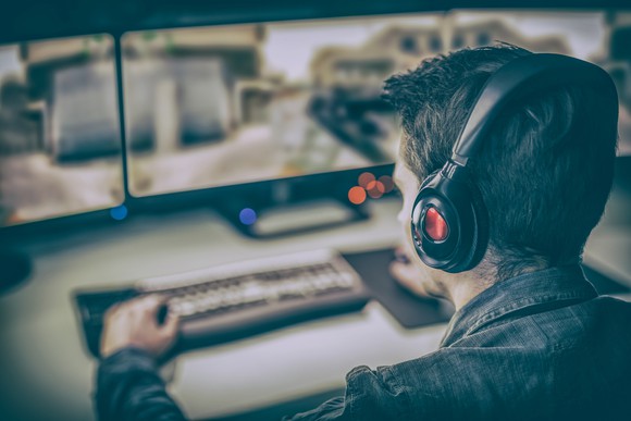 Gamer playing a video game. 
