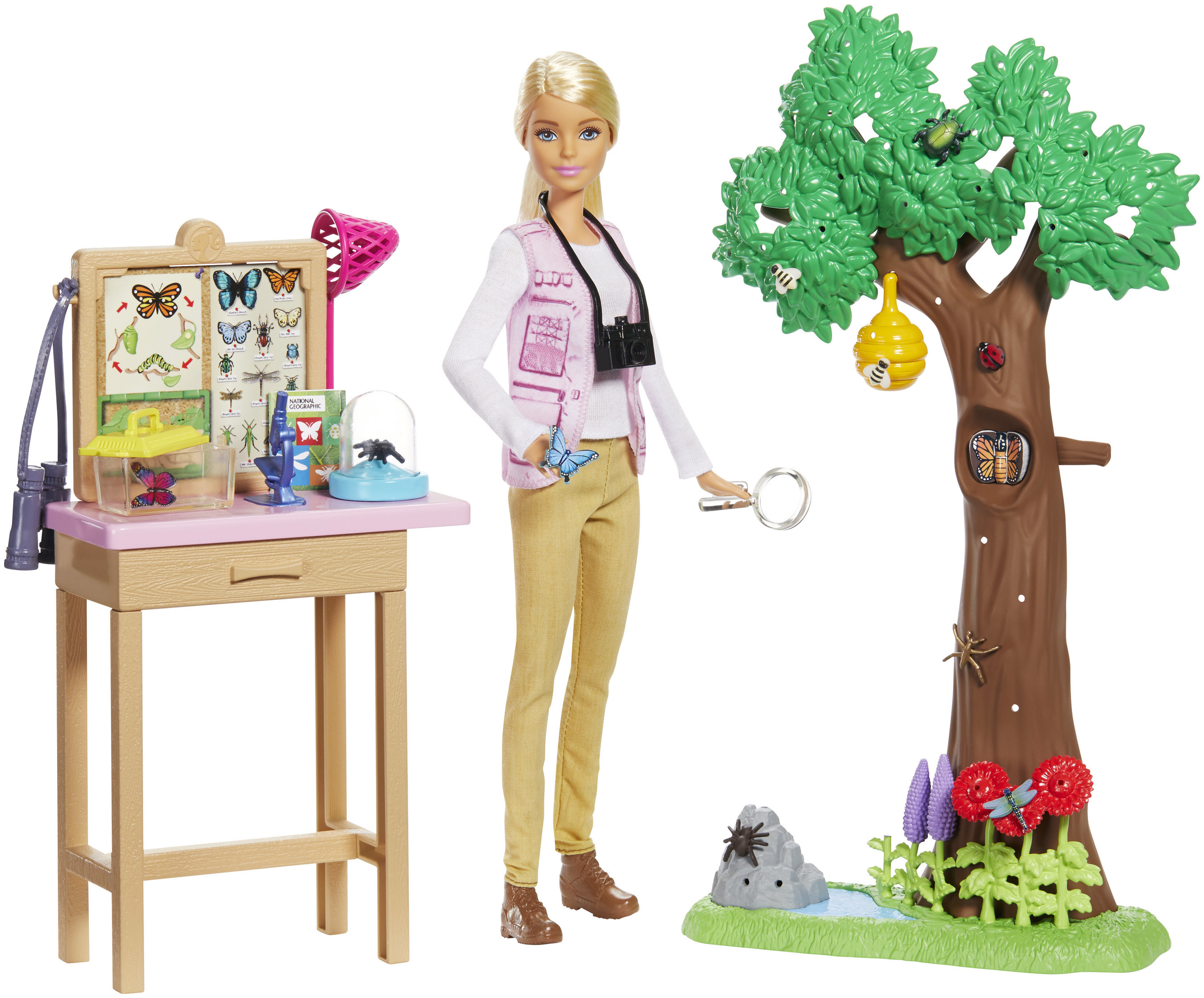 Barbie as part of a play set featuring a tree on one side and a butterfly collection on a table on the other.