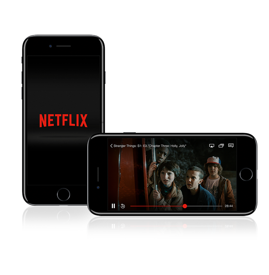 One iPhone standing vertically showing the Netflix logo, and another laying landscape showing a scene from the Netflix original series Stranger Things