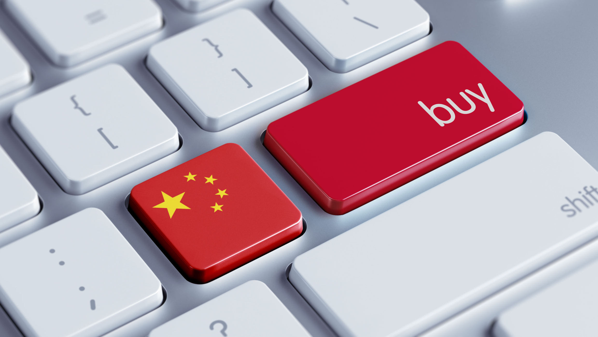 Two buttons on a keyboard, one with a Chinese flag and another labeled as a "buy" button.