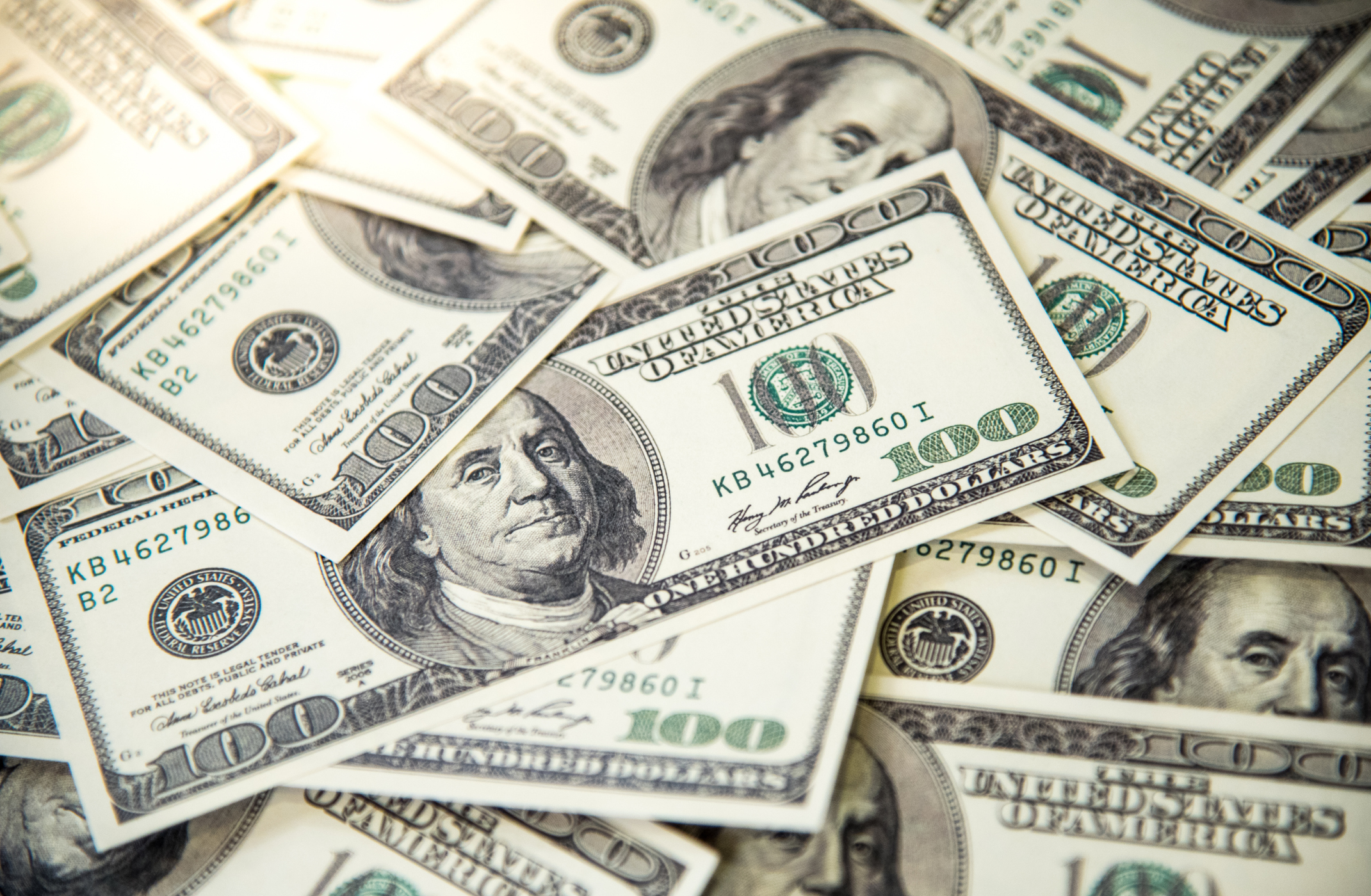 Pile of $100 banknotes
