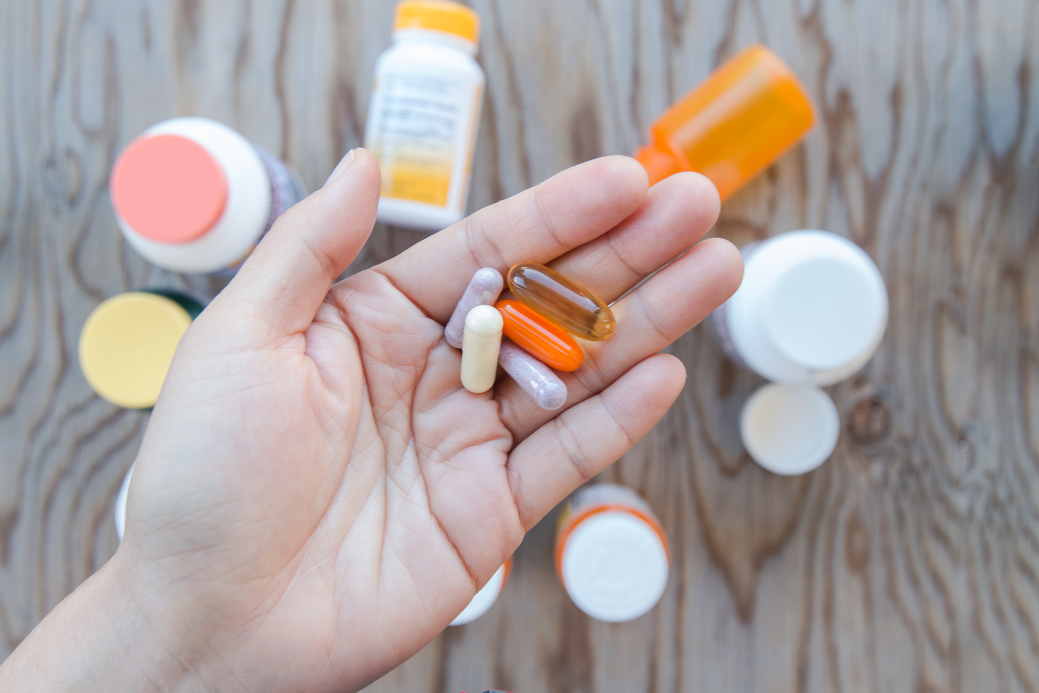 A handful of health supplements.