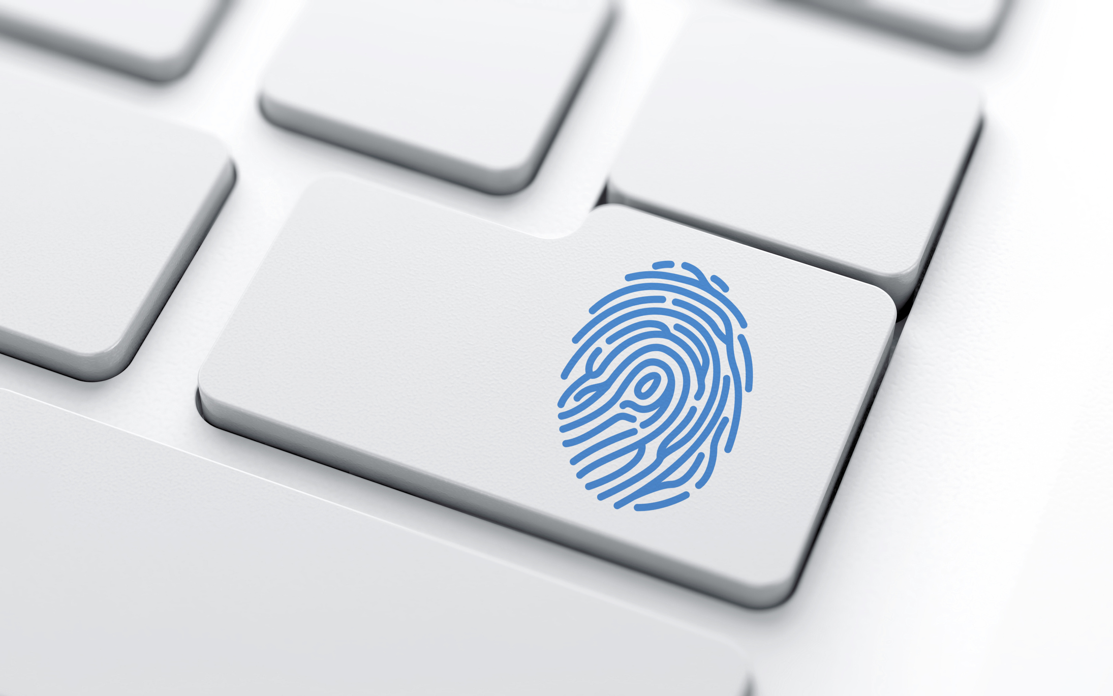 A blue fingerprint on a keyboard key