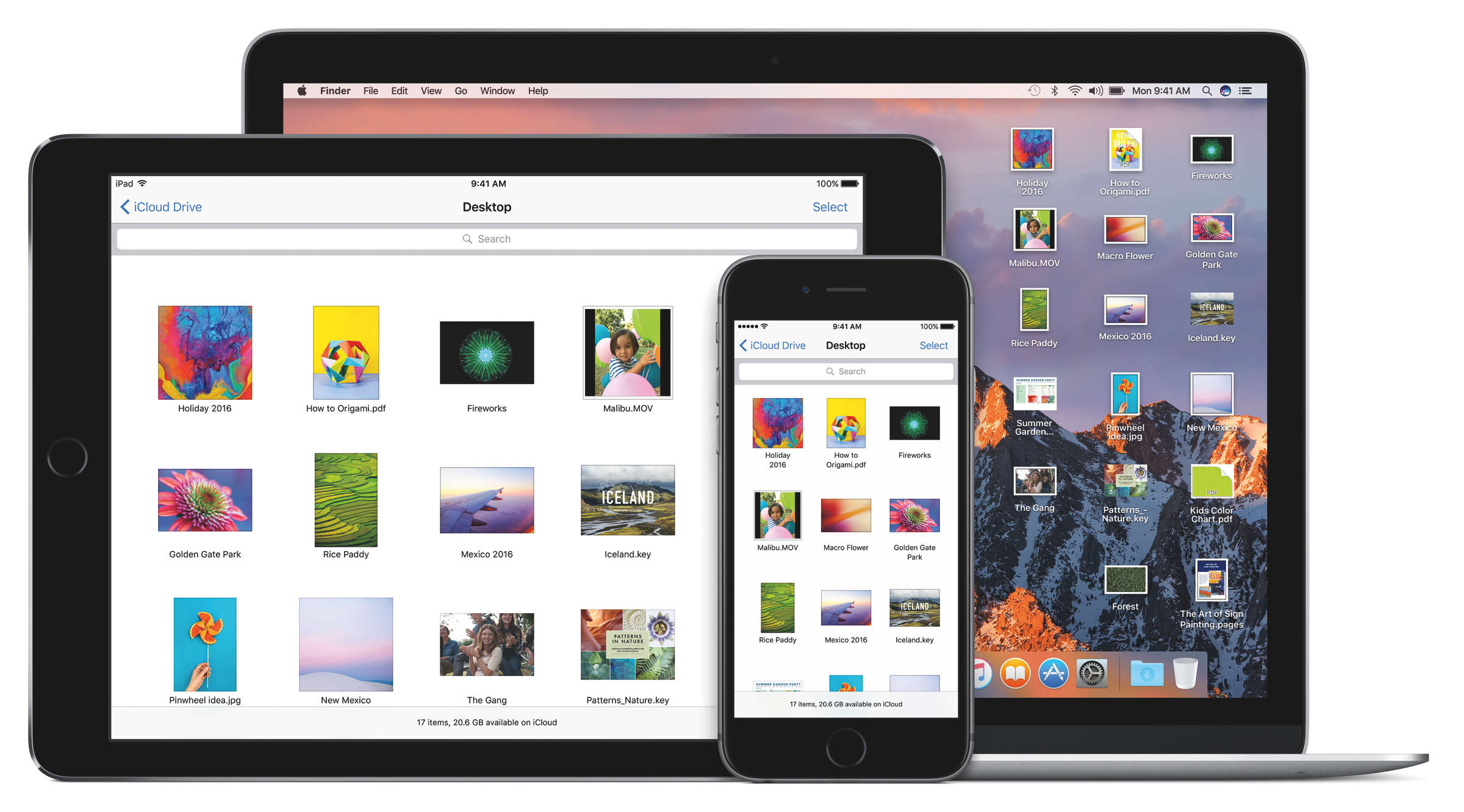 An IPad and an iPhone displaying iCloud, in front of a laptop