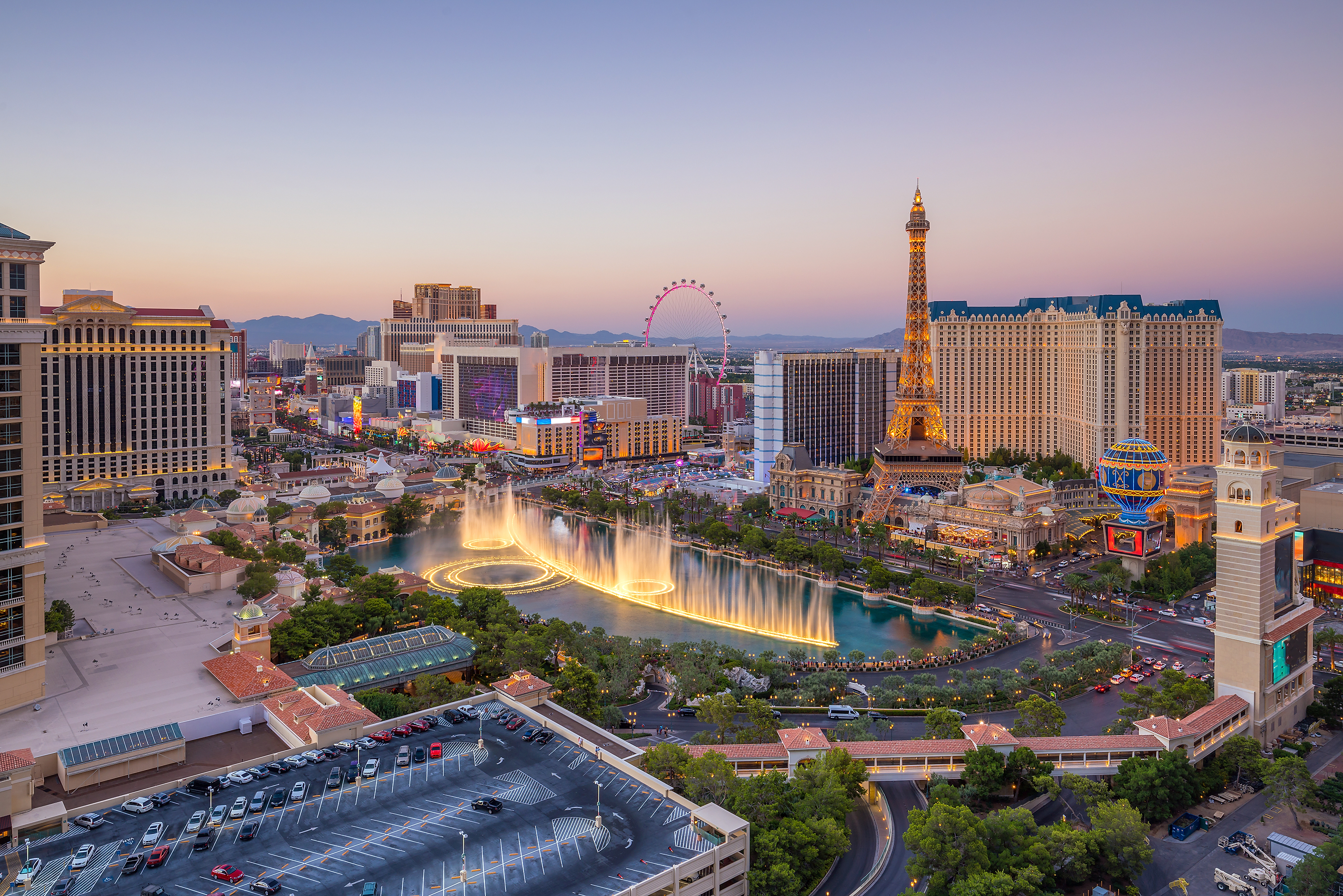 The Las Vegas Strip with a fountain and casinos filling the view
