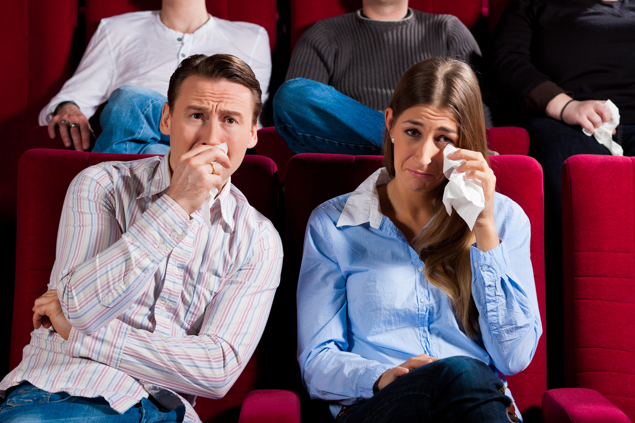 Couple crying in theater