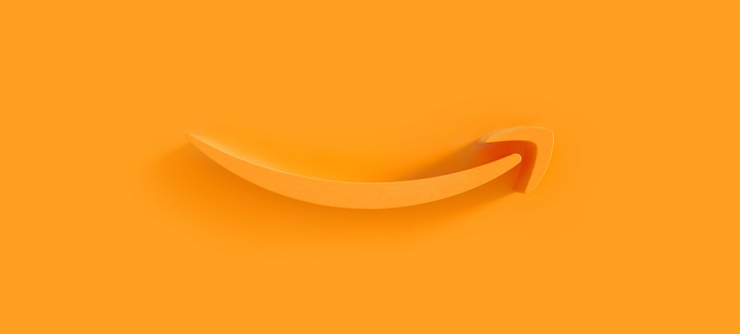 Amazon's smile logo rendered in 3D on orange background.