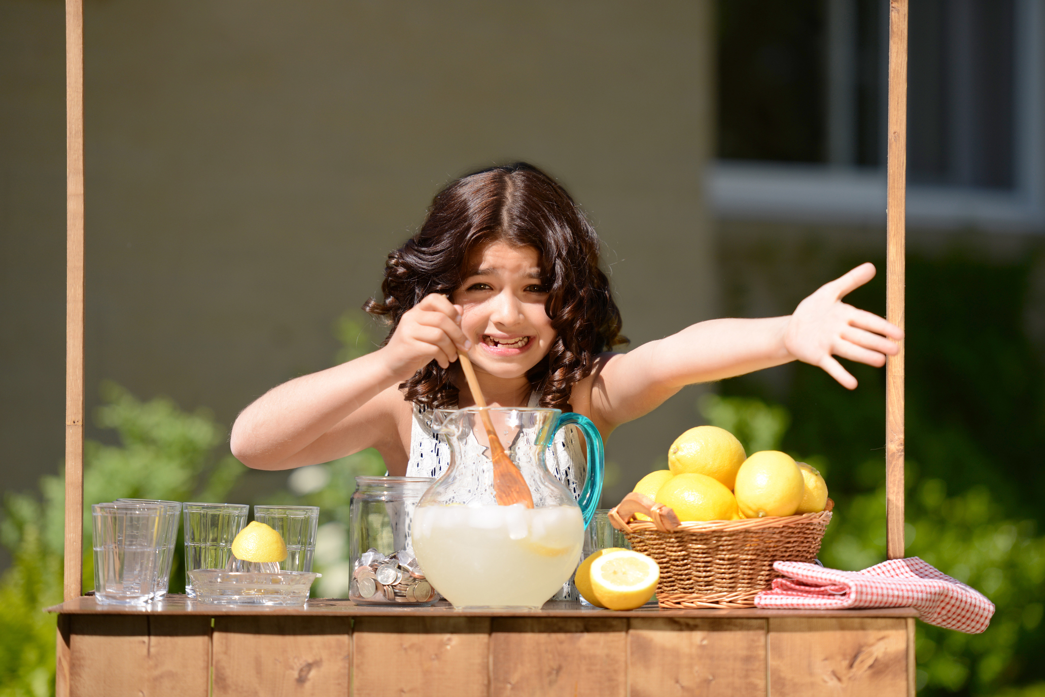 Young girl selling lemonade
