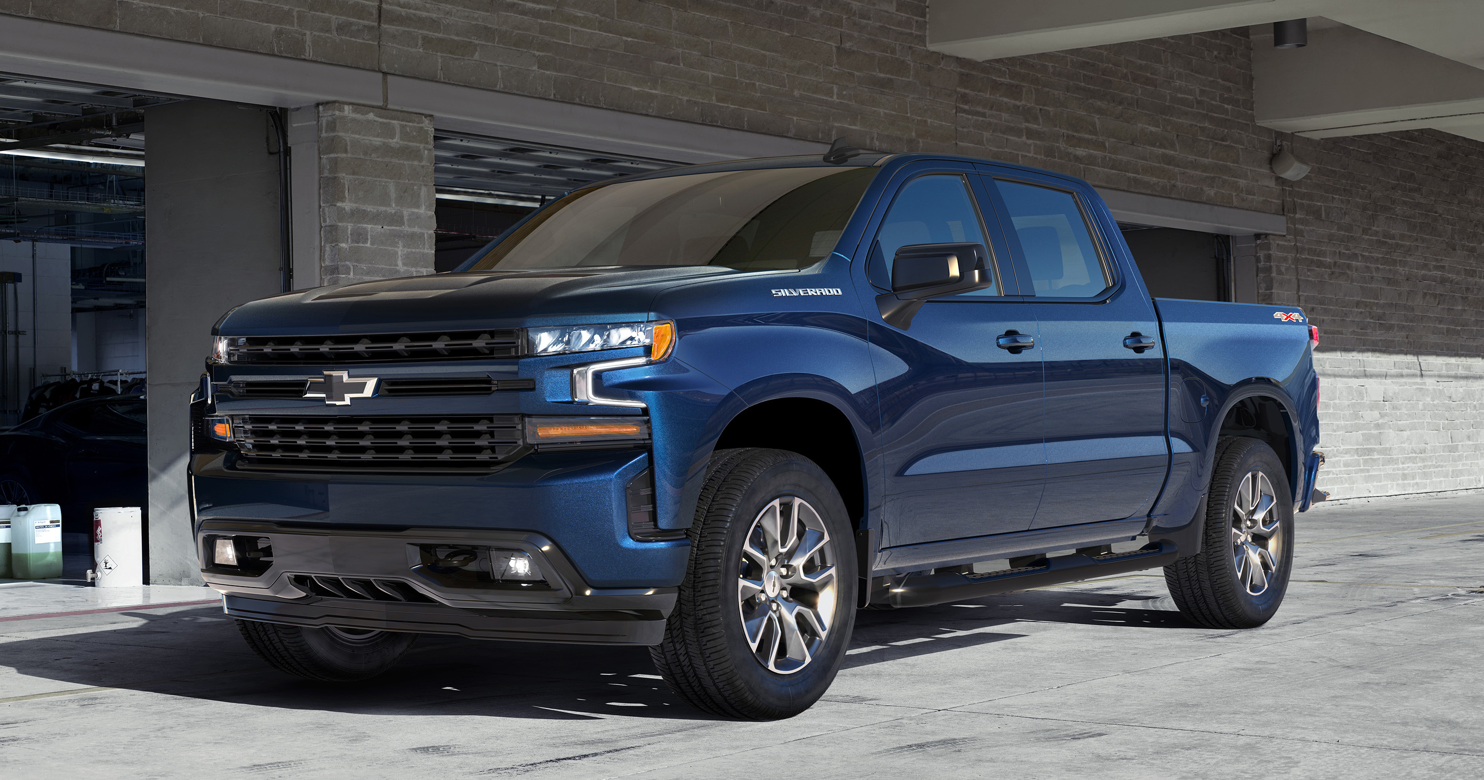 A blue 2019 Chevrolet Silverado crew-cab pickup truck.