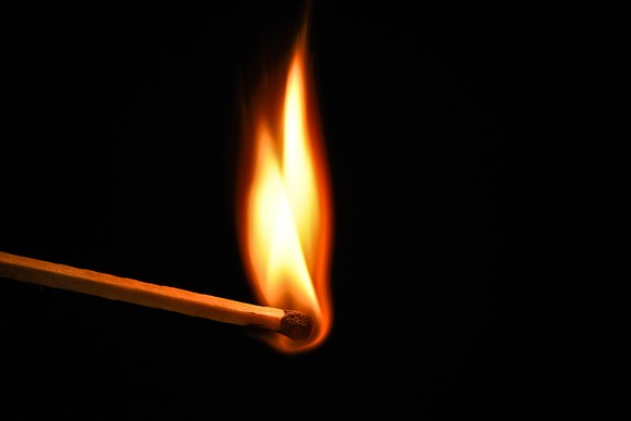 Lit match.