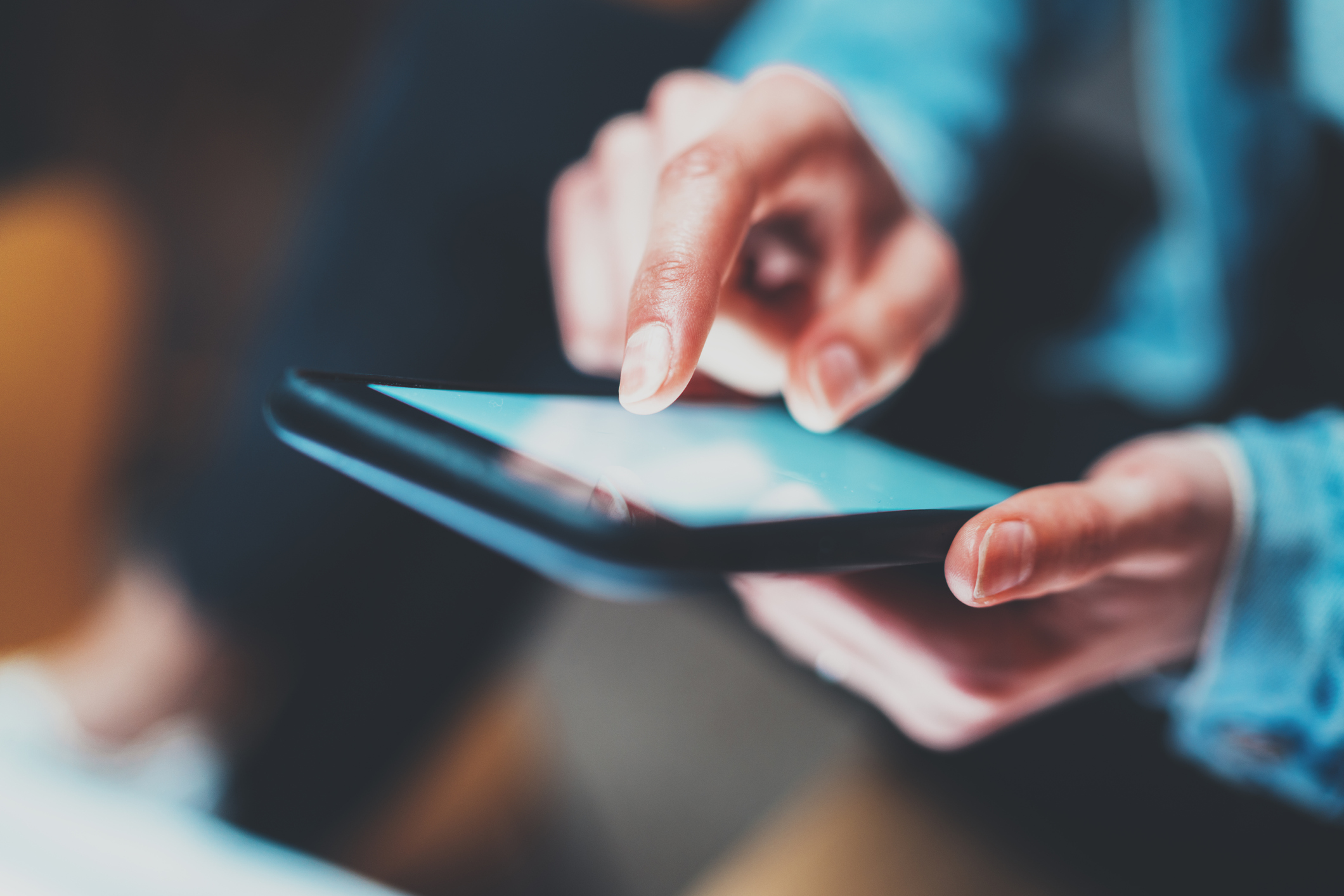 A person using a mobile phone.