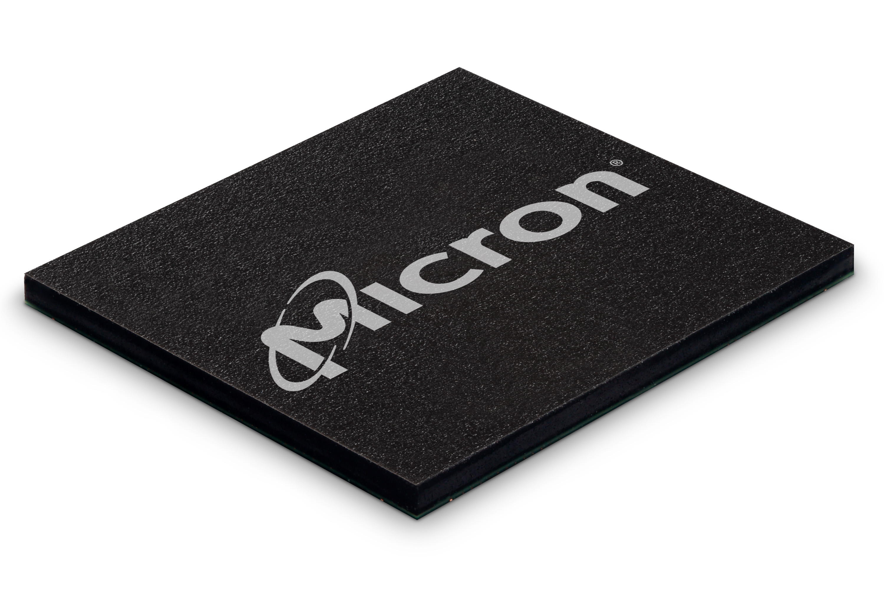 Close-up shot of a NAND memory chip, sporting Micron's corporate logo in grey on black.
