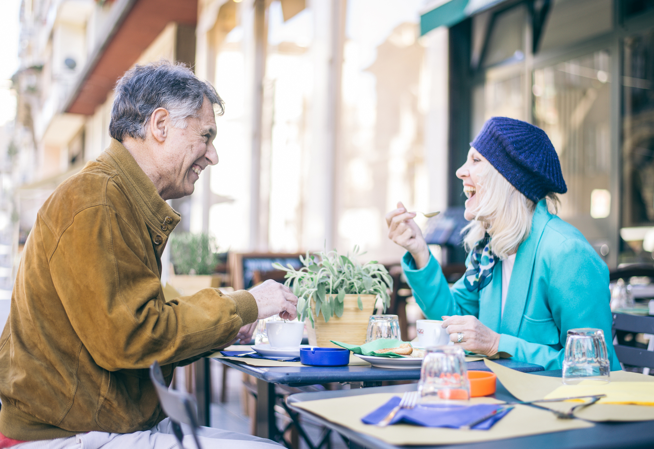 Older man and woman dining out