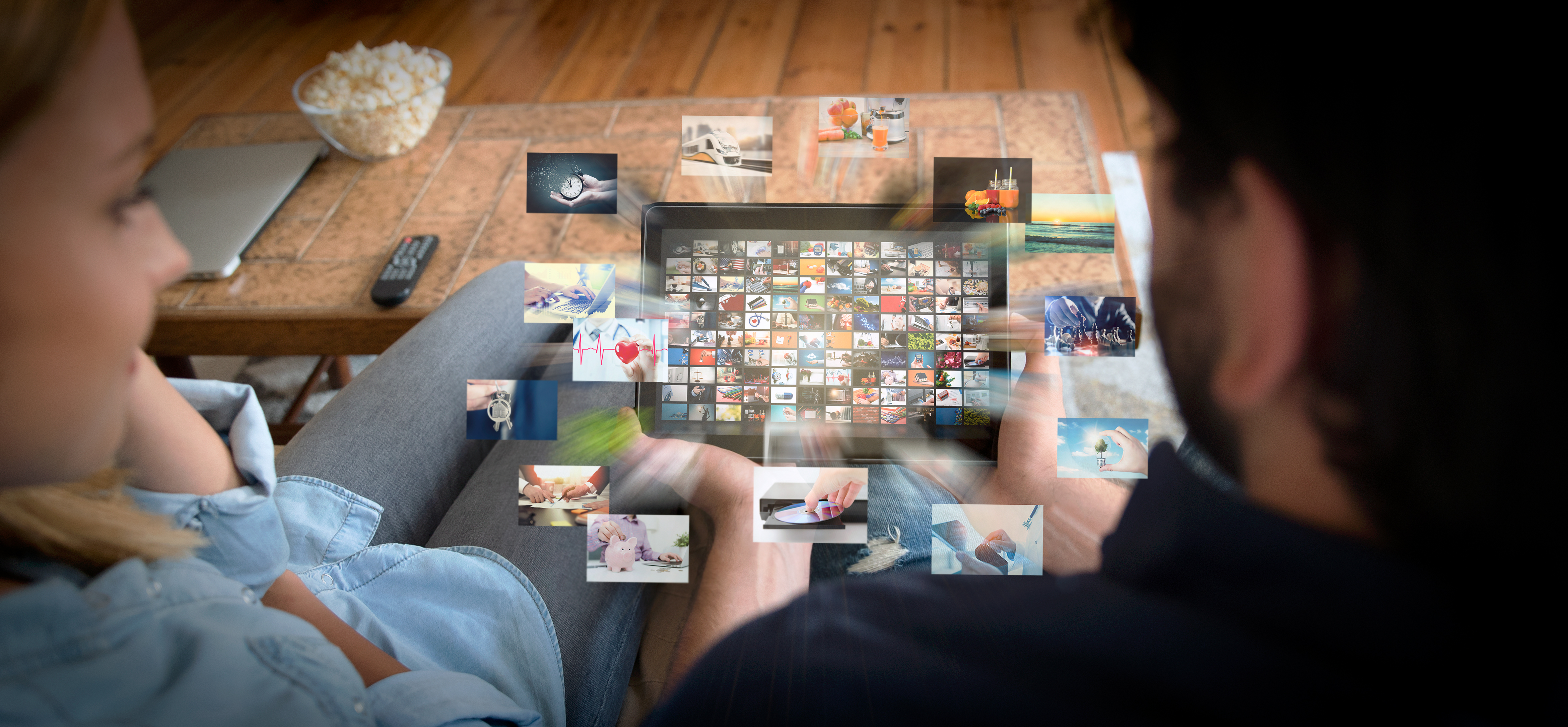 Couple looking at tablet with apps