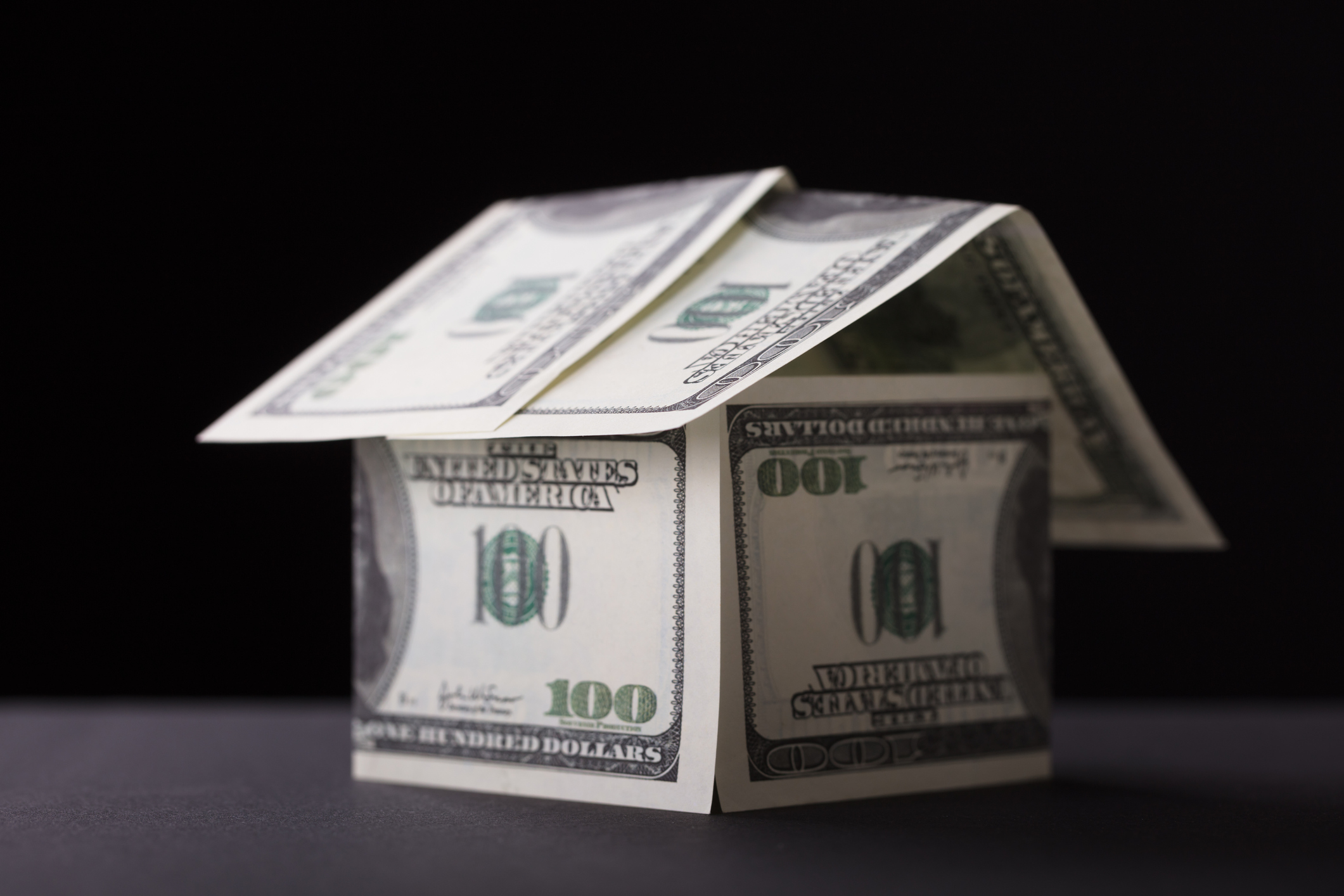 A house made out of $100 bills.