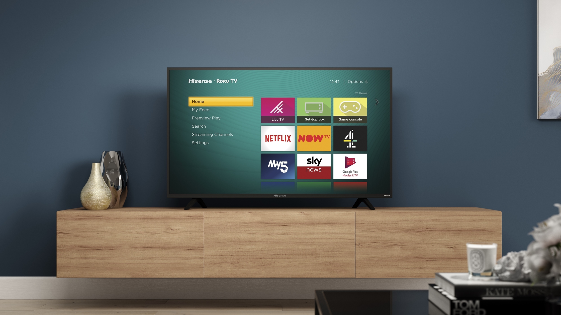A television in a living room, showing viewing options.