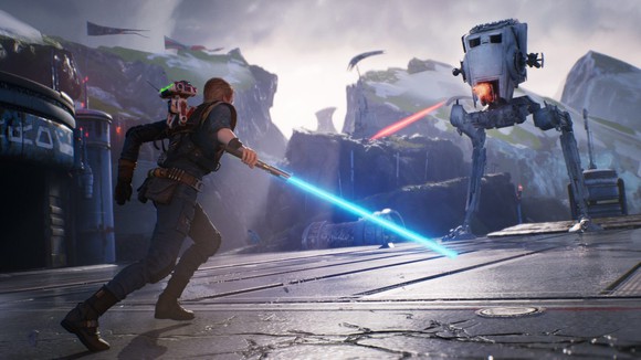 Screenshot from Electronic Arts' upcoming Star Wars game, with a character holding a lightsaber facing down a giant weaponized machine