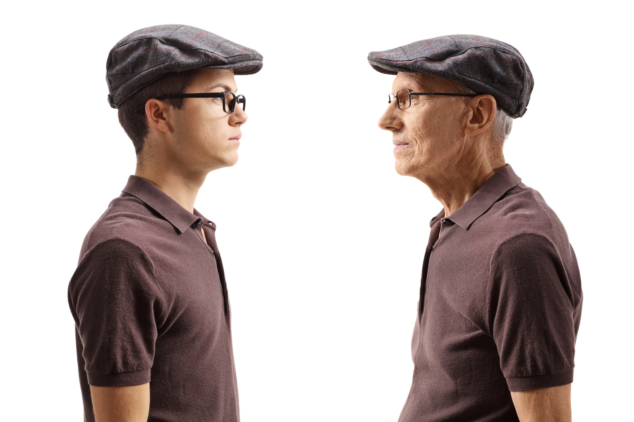 Old man looking at young man dressed identically
