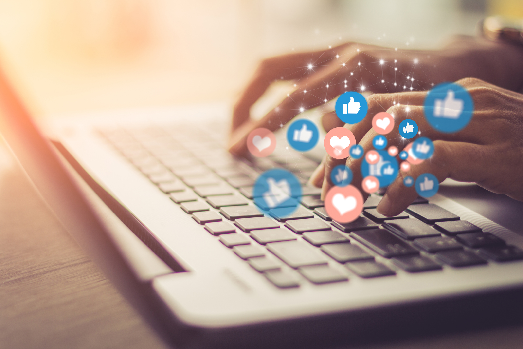 Typing up likes and hearts on a keyboard